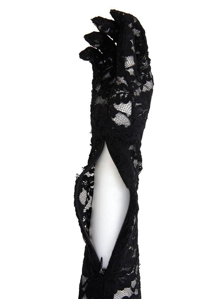 This very unique catsuit guarantees a unique look.  Made out of a beautiful lace pattern partly opaque with a headpiece detail and attached gloves.  Reflecting a very unique, strong and confident look.