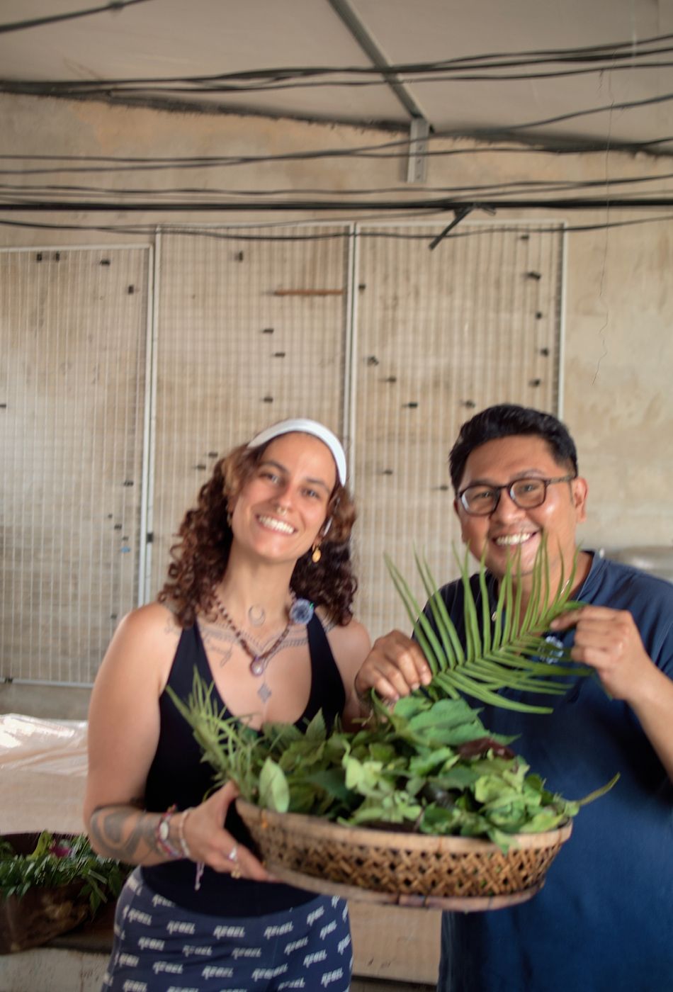 Sarah and Arry with fresh leaves at the Ecoprint workshop